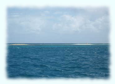 Mopion, die Insel mit dem Sonnenschirm