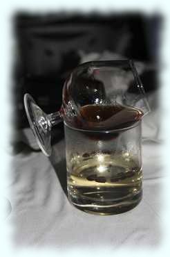 Cognac über einem erwärmten Wasserglas
